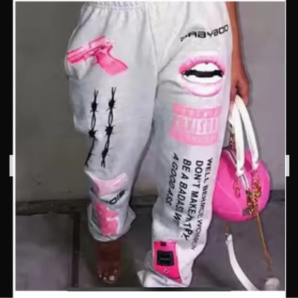 Y2K Printed joggers. Elastic at the ankle letter print with pockets. . Polyester